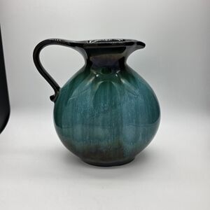 Glazed Teal Ceramic Pitcher with Black Accents